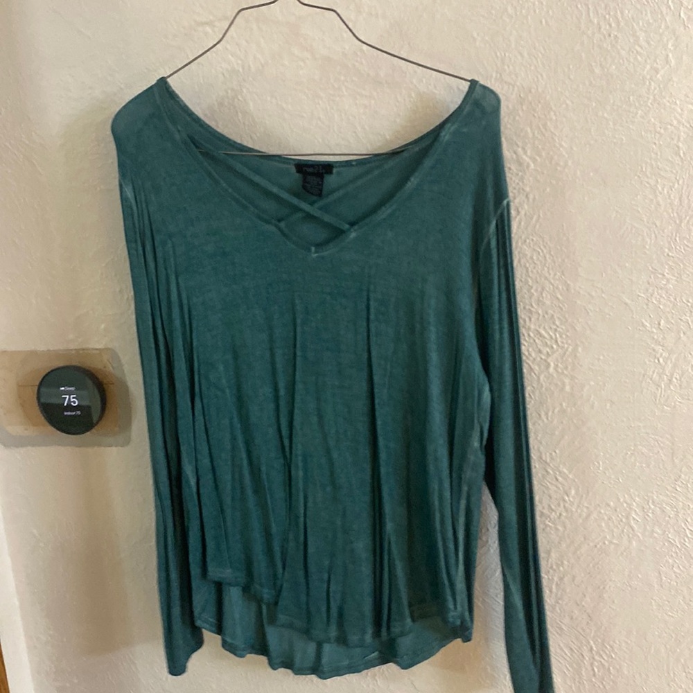 Crisscross teal long sleeve top